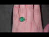 Emerald Ring with Emerald Cut Diamond Side Stones Set in 18ct White Gold